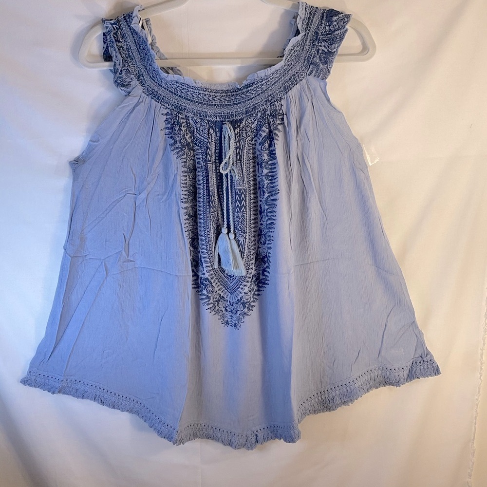 Roaman’s sleeveless shirt